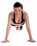 Fitness Lady Performs Pushups On The Floor Stock Photo