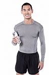Fitness Man Posing With Water Bottle Stock Photo