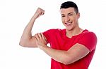 Fitness Man Showing Bicep Muscles Stock Photo