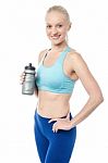 Fitness Woman Holding Sipper Bottle Stock Photo