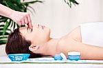 Forehead Massage Treatment In Salon Stock Photo