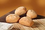 Four Breads On The Table Stock Photo