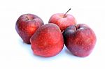 Four Red Apples Stock Photo