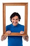 Framed Interest, Smiling Young Male Stock Photo