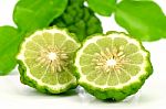 Fresh Fruits And Green Leaves Of Kiffir Lime Or Leech Lime On Wh Stock Photo