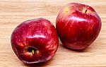 Fresh Red Apple On Wood Background Stock Photo