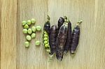 Fresh Ripen Peas Isolated On Wooden Background Stock Photo