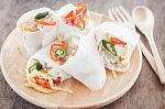 Fresh Spring Rolls On Wooden Table Stock Photo