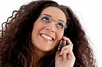 Friendly Woman Busy With Phone Call Stock Photo