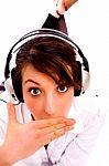 Front Pose Of Amazed Woman Listening Music Stock Photo