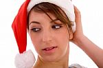 Front View Of Female Looking Sideways Wearing Christmas Hat Stock Photo