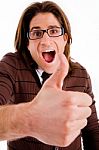Front View Of Happy Male With Thumbs Up Stock Photo