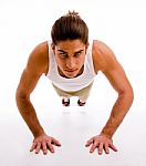 Front View Of Man Doing Pushups Stock Photo