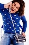 Front View Of Man Shouting On Phone Stock Photo