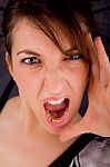Front View Of Shouting Young Woman Stock Photo