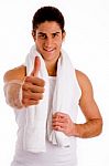 Front View Of Smiling Man With Thumbs Up Stock Photo
