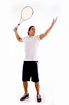 Front View Of Tennis Player Servicing Stock Photo
