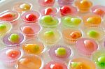 Fruit Shaped Mung Beans In Jelly Close Up In White Foam Dish, Wun Look Choup Thai Sweets Stock Photo