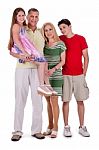 Full Length Of Happy Family Looking At You Stock Photo