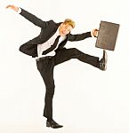 funny Businessman dancing with case Stock Photo