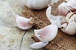 Garlic On Sackcloth Stock Photo