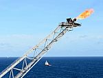 Gas Flare at sea Stock Photo