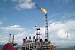 Gas Or Flare Burn On Offshore Platform Stock Photo