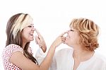 Girl And Mother Touching Their Nose Stock Photo