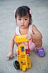 Girl Baby Playing Toy Stock Photo