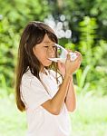 Girl Drinking Milk Stock Photo