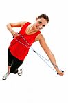 Girl Exercising With Elastic Fitness Band Stock Photo