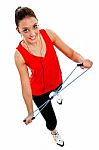 Girl Exercising With Elastic Fitness Band Stock Photo