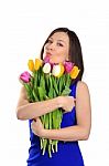 Girl Hugging Fresh Tulips Stock Photo