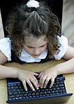 Girl On Computer Stock Photo