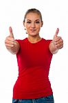 Girl Showing Double Thumbs Up Stock Photo