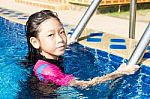 Girl Side Of Swimming Pool Stock Photo