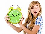 Girl Surprised With Alarm Clock Stock Photo