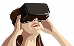 Girl Wearing Virtual Reality Goggles Looking Towards Sky Stock Photo