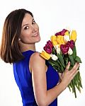 Girl With Tulips Stock Photo
