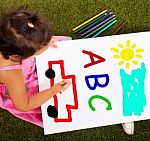 Girl Writing Abc Shows Kid Learning Stock Photo