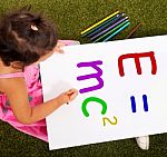 Girl Writing Formula Shows Learning Stock Photo