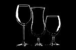 Glasses For Wine, Beer And Cocktail On Black Background Stock Photo