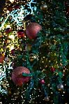 Glitter Red Ball Celebrate Christmas On Tree With Wire White Light Vignette Background Stock Photo