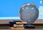 Globe And Books On Table Stock Photo