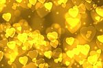 Golden Heart shaped Background Stock Photo