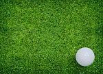 Golf Ball On Green Grass Stock Photo