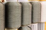 Gray Silk Thread In Spool Stock Photo
