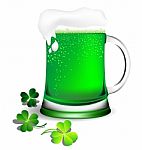 Green Beer In Glassware With Shamrock Leaves Stock Photo