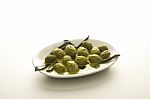 Green Olives In Olive Oil Stock Photo