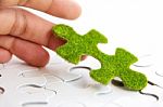 Green Puzzle Piece, Stock Photo